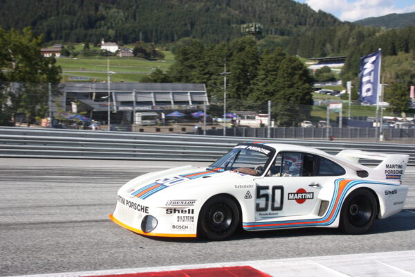 Harald Grohs v Porsche 935/77